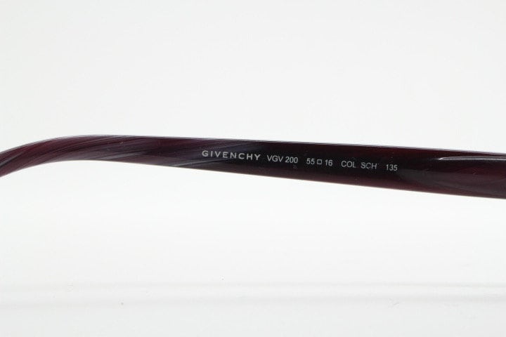 Givenchy rectangular frameless eye glasses made in Italy. Minimal optical frame with marbled brown arms. Prescription RX spectacles. Vintage
