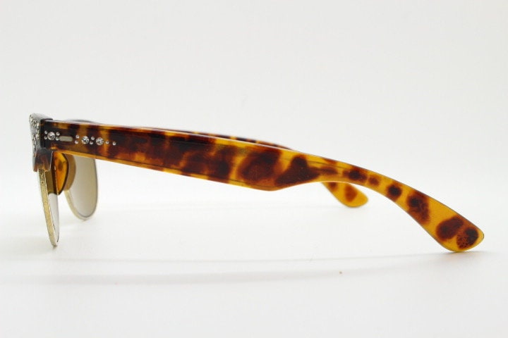80s vintage browline diamante sunglasses. All time classic design in tortoise gloss with gold half rim and rhinestones. 50s rockabilly