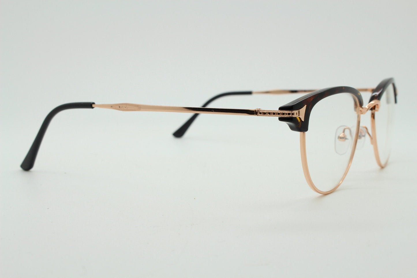 90s vintage browline cat eye glasses. Honey tortoise and gold half frame eyeglasses. 50s, 60s cateye design with clear lenses. NOS