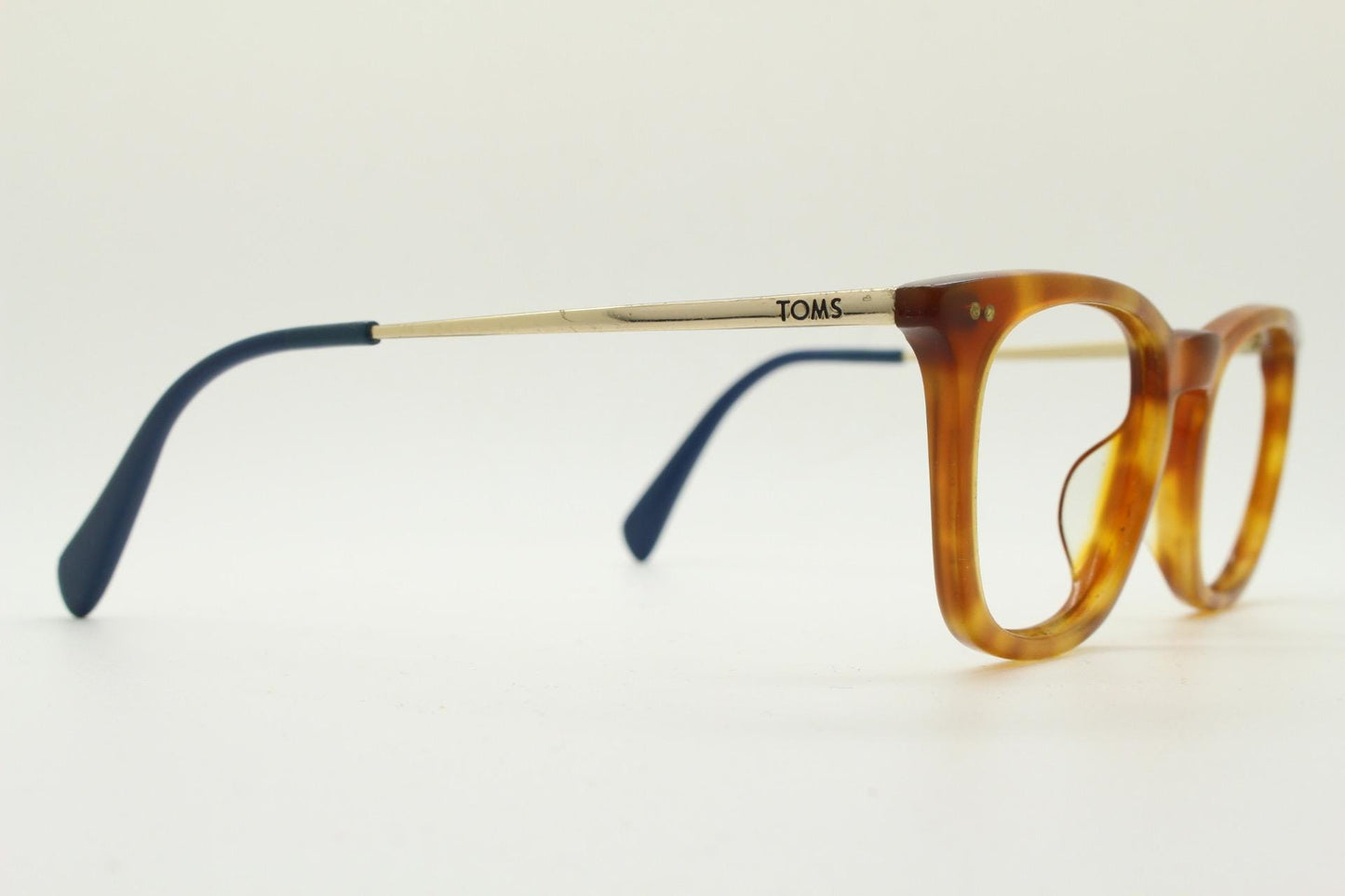 Tom's rectangular horn rim eye glasses. Classical 40s design in amber acetate with gold arms. Prescription optical frames. RX spectacles