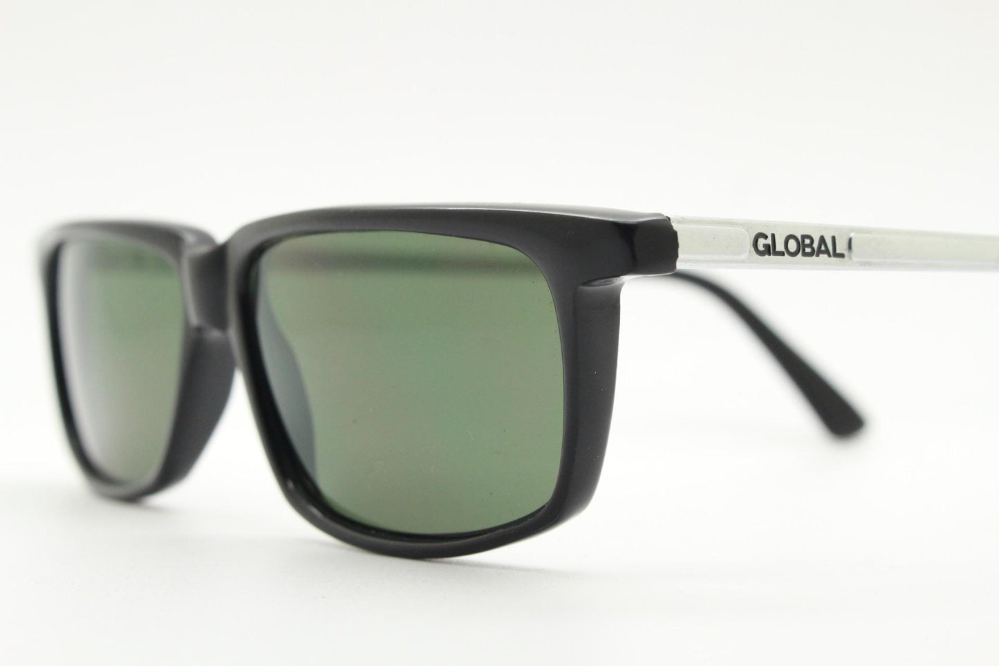 Global Eyewear vintage 90s vintage rectangular low profile sunglasses model 4330. Black flat top frame with silver chrome arms. NOS