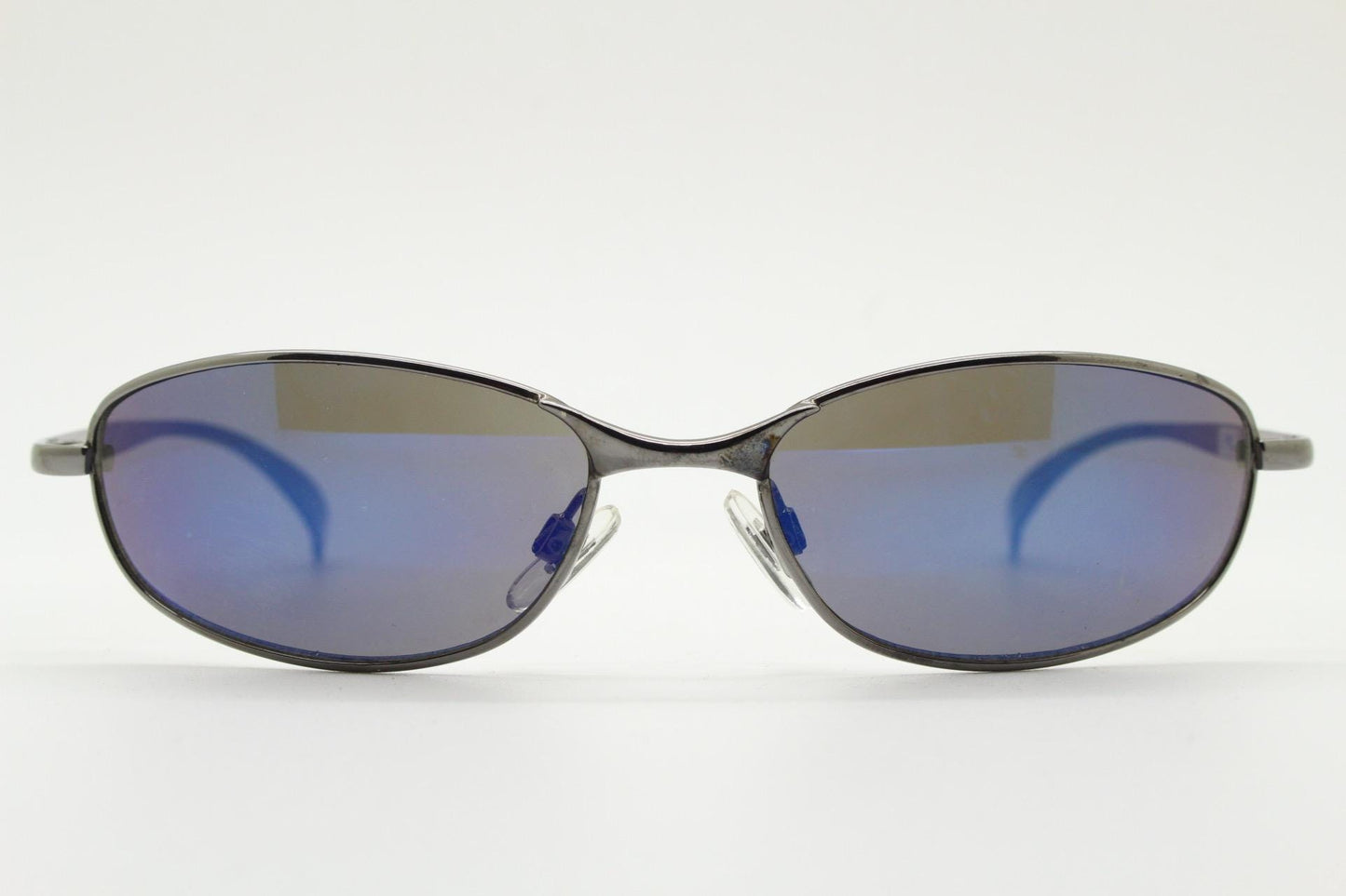 90s vintage oval small bug eye sunglasses. Curved grey chrome finish solid metal frame with blackout mirror lenses. Quality NOS