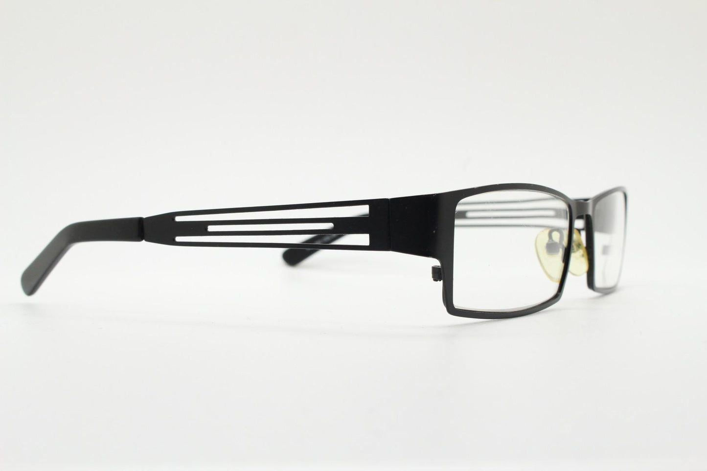 Police 90s vintage rectangular eye glasses model 023. Solid metal optical frame in black satin finish with cut out arm stripes. Prescription