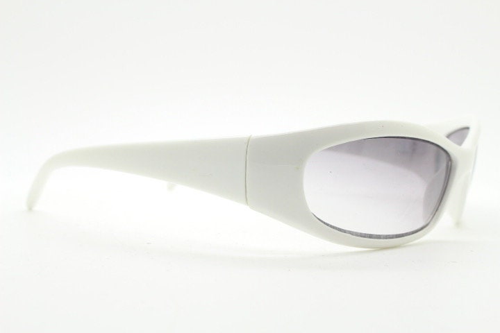 Y2k vintage wrap around bug eye sunglasses. Curving ice white shield frame with light tone lenses. Rave. Super hero cosplay 2000s NOS