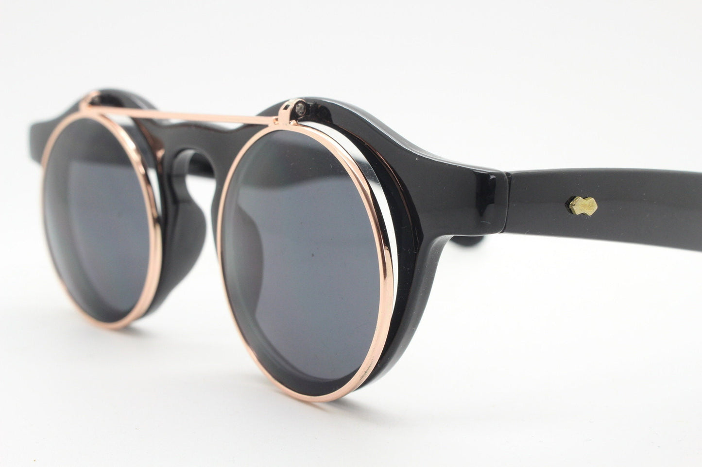 Vintage 90s round flipper sunglasses. 30s style black frame with clear lenses and flip up sunglasses visor. BNWT unused