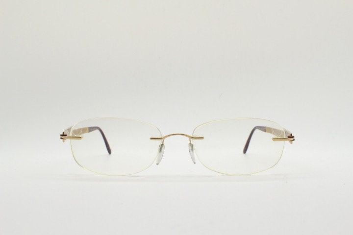 Silhouette rectangular frameless eye glasses made in Austria. Minimal optical frame with enamel and diamantes. Prescription RX. Rhinestone
