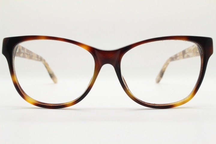 Max & Co cat eye glasses. Tortoise front acetate optical frame with crystal arms and brown camouflage. Womens vintage prescription RX