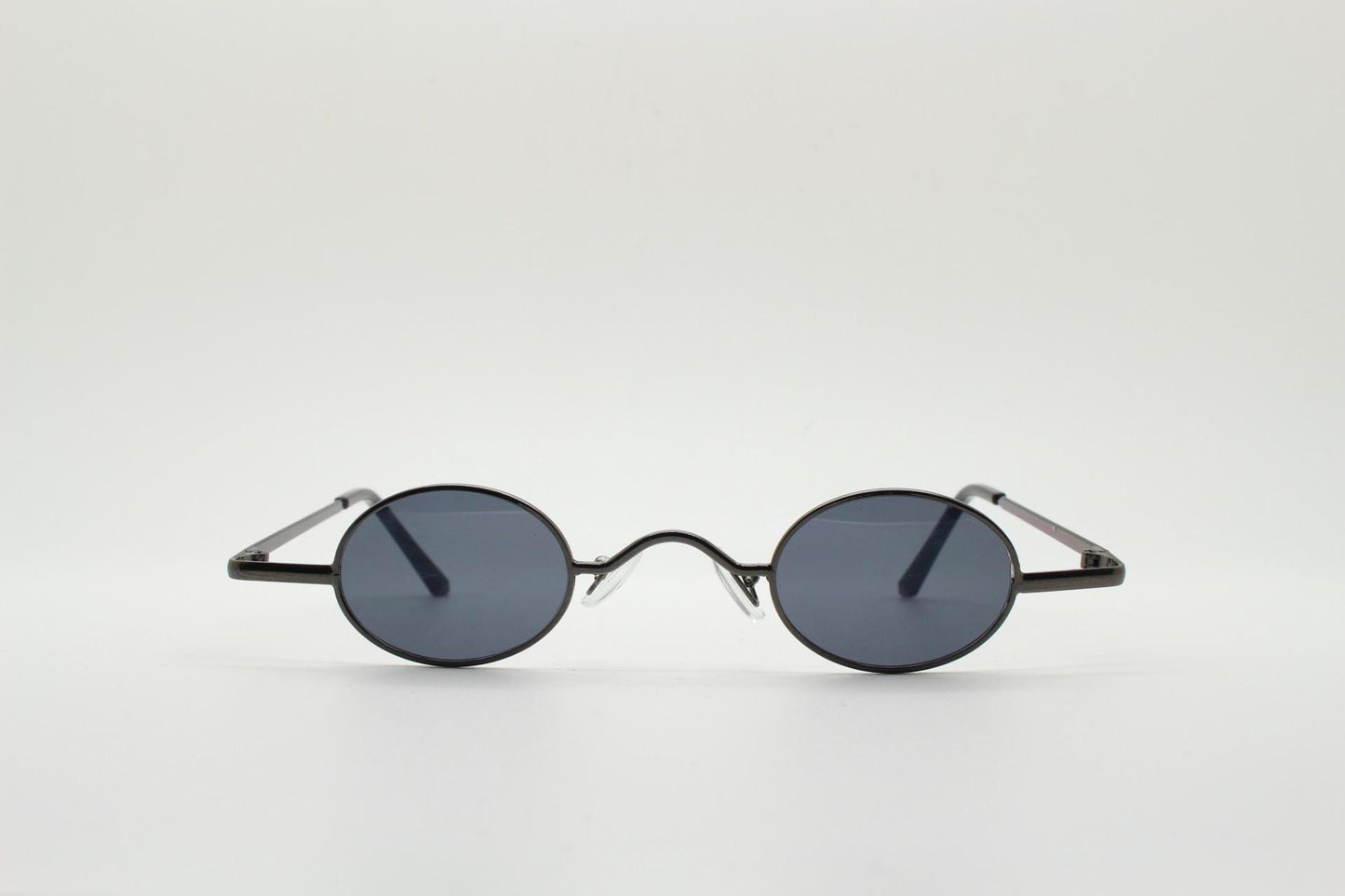 90s vintage small oval sunglasses. Imposing minimal grey gloss metal victorian antique style frame. Steampunk. Unused NOS