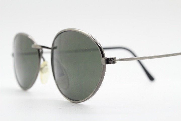 90s vintage metal oval sunglasses. Minimal brushed bronze finish brown frame with plain green lenses. Steampunk. Unused NOS