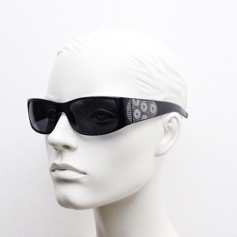 Assoluto 90s vintage wrap around rhinestone shield sunglasses made in Italy. Deep blue acetate frame with dazzling diamante circles. NOS