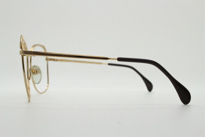 Silhouette 70s vintage eye glasses made in Austria. Womens sophisticated oversized angular gold optical frame. Prescription eyeglasses. Rx