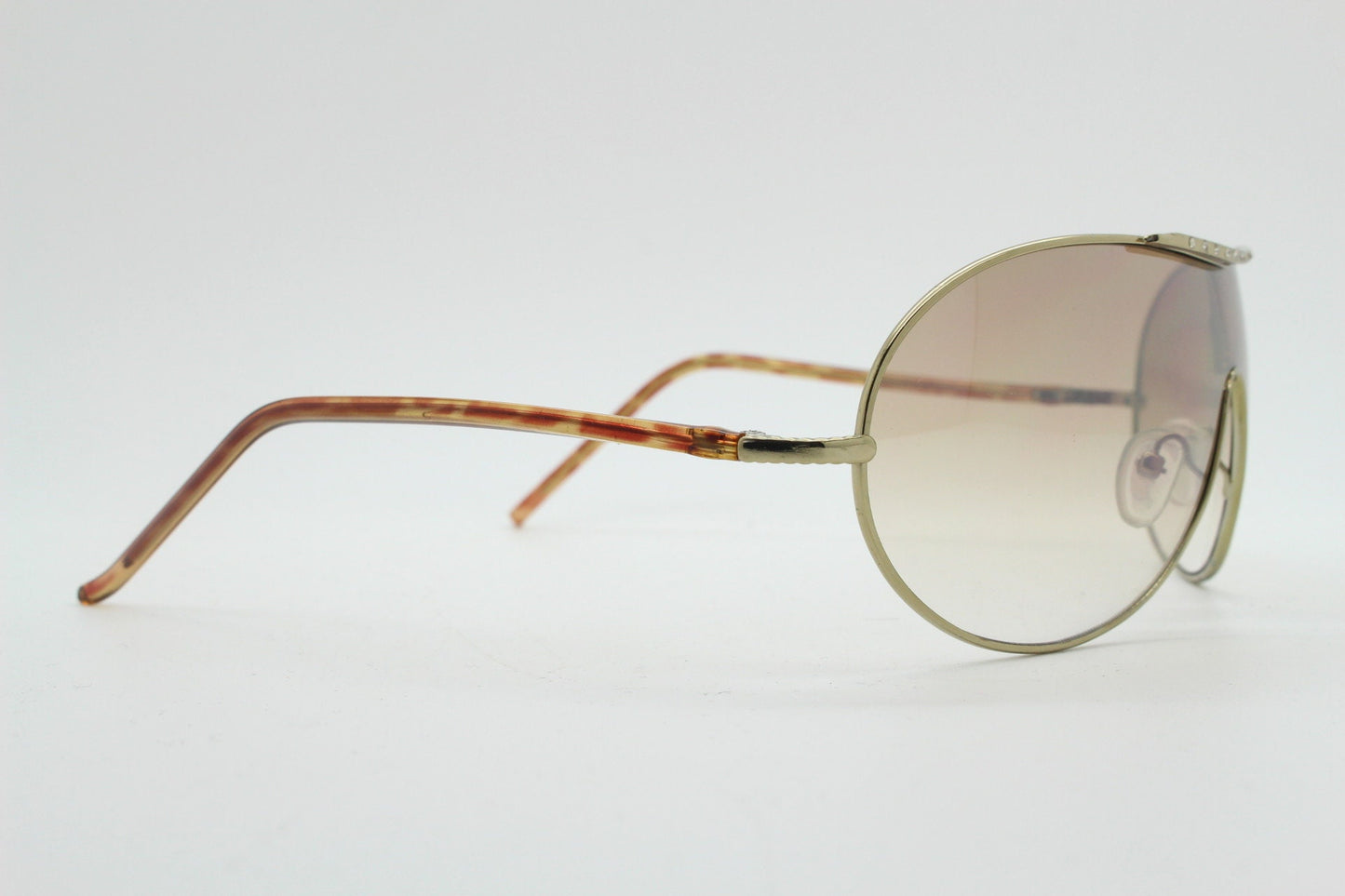 Y2K vintage visor aviator sunglasses. 2000's brown wraparound mono lens mini mask shield design with slim gunmetal arms. BNWT. 00's NOS