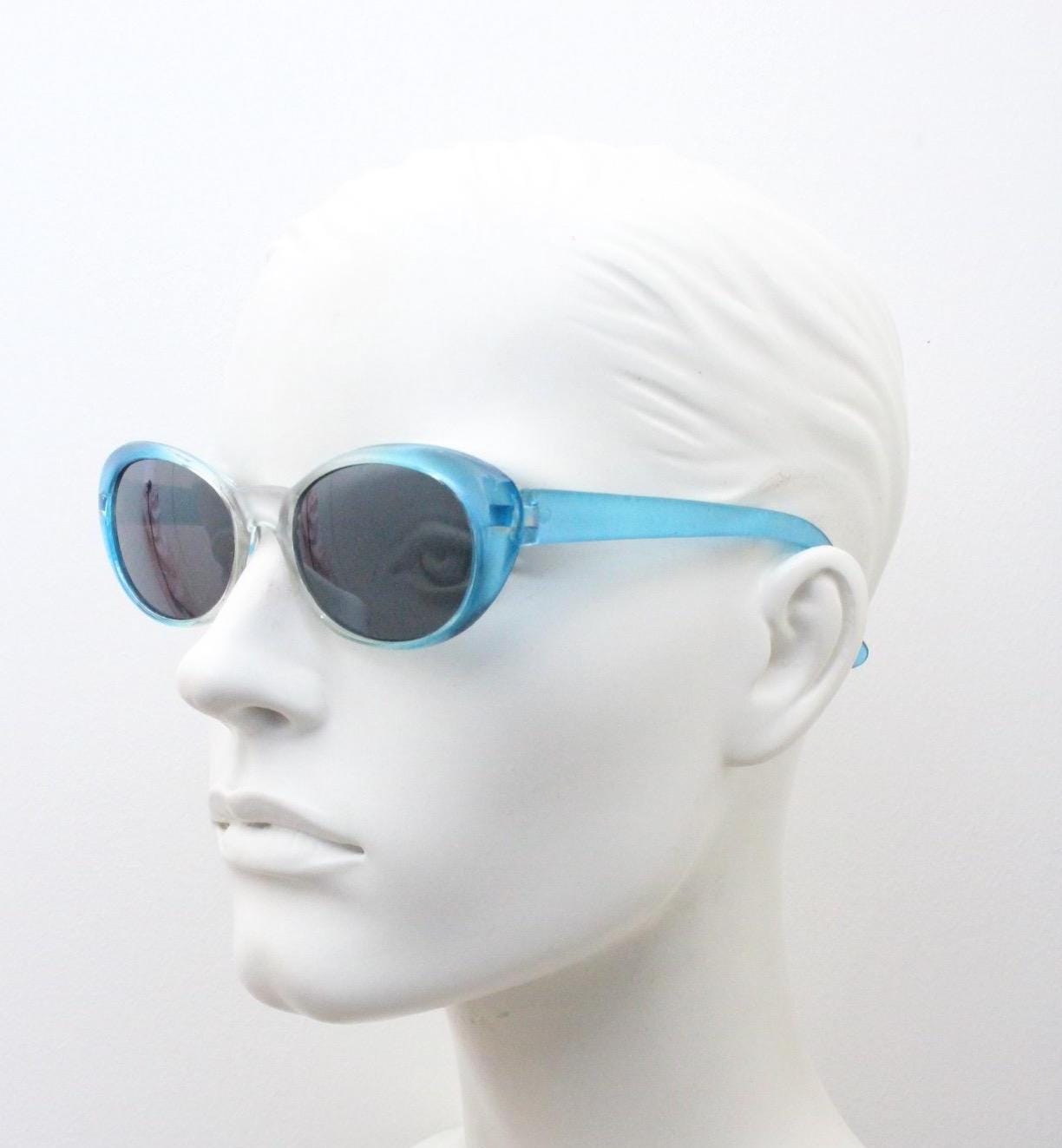 90s vintage oval cat eye sunglasses. Womens pearlised silver to aqua blue ombre fade cateye frame with contrasting dark lenses