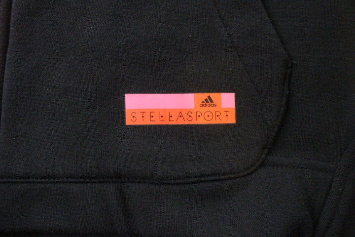 Stella Mc Cartney for Adidas Stellasport vintage zipper hoody. Black batwing track top with pink double zip detachable hood and tail section