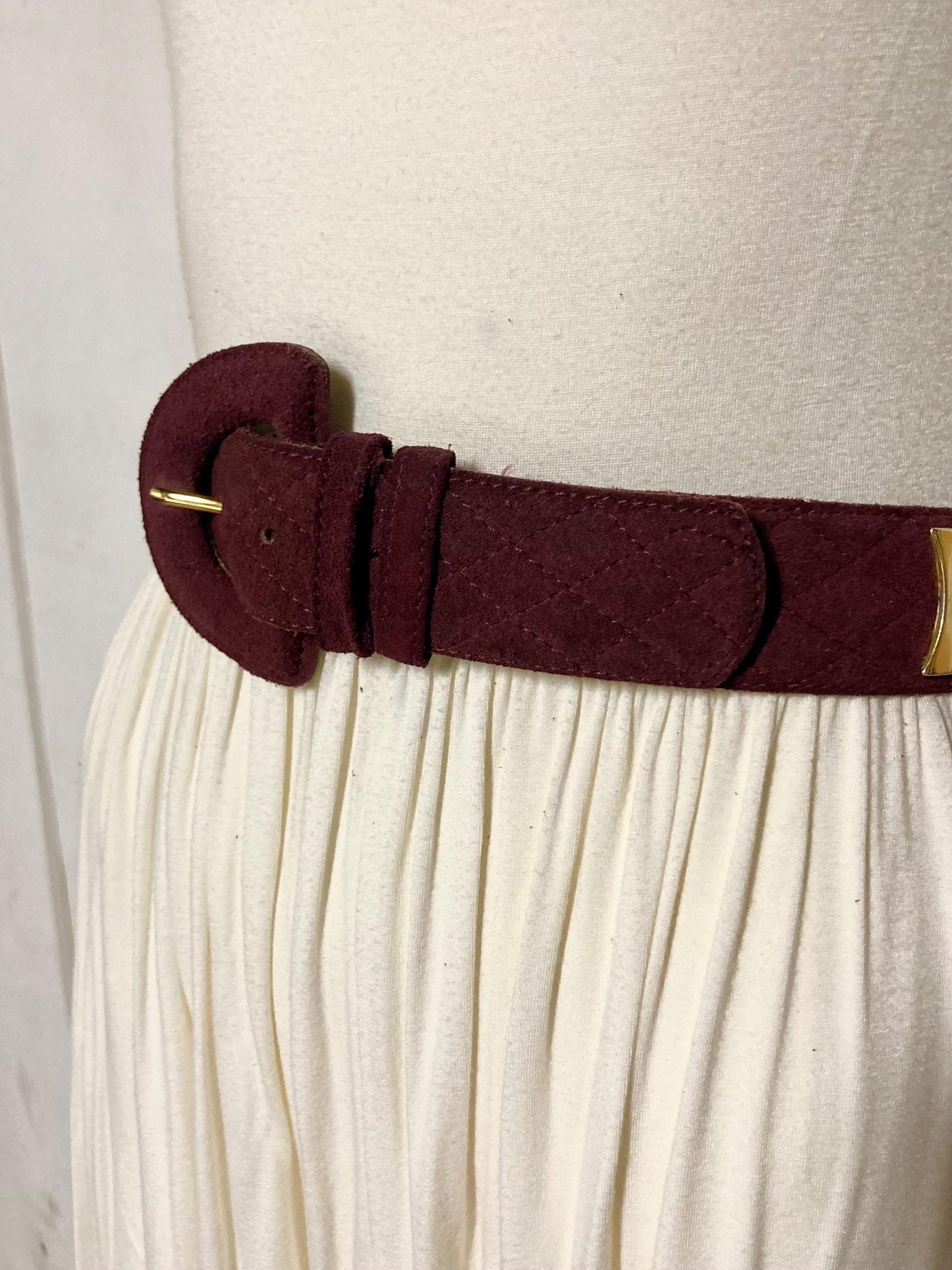 80s vintage womens dress belt in wine real suede with substantial covered buckle and gold domed hearts. Made in France by Chanon. NOS