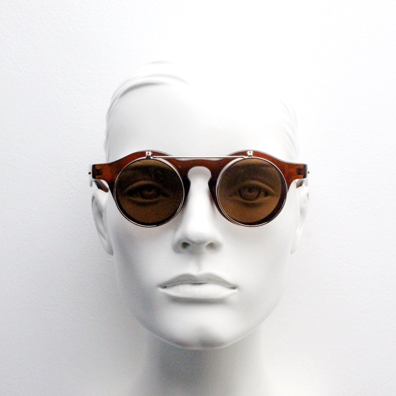 Vintage 90s round flipper sunglasses. 30s style brown frame with clear lenses and flip up sunglasses visor. BNWT unused