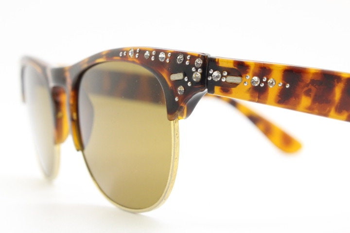 80s vintage browline diamante sunglasses. All time classic design in tortoise gloss with gold half rim and rhinestones. 50s rockabilly