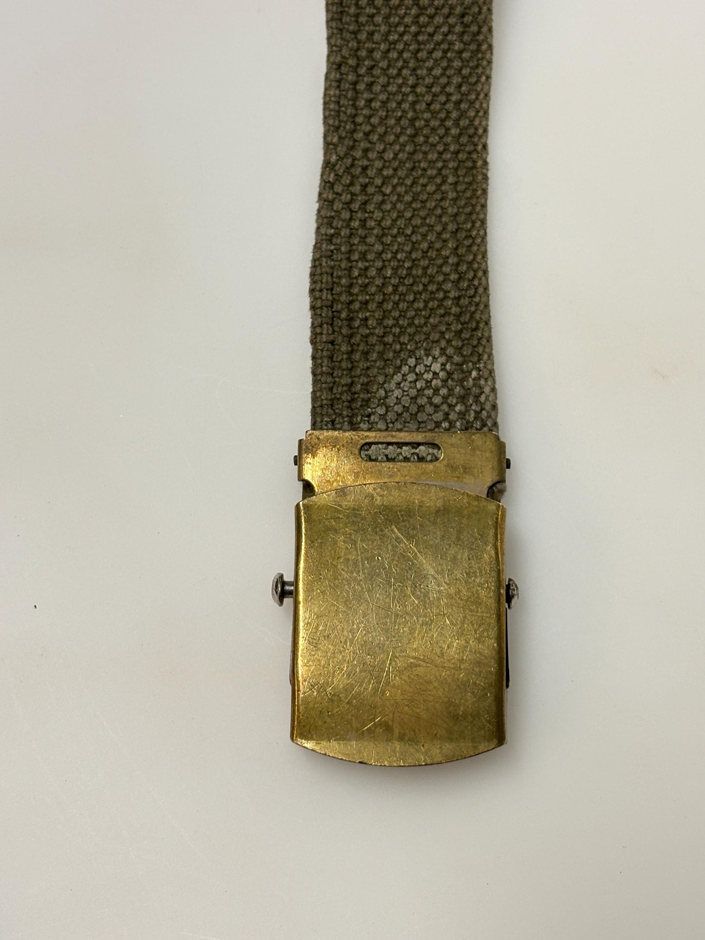 2 x bundle 80s vintage canvas army belts. One black plus one khaki green no holes format. Slide lock gold buckle. Webbing. Fully adjustable