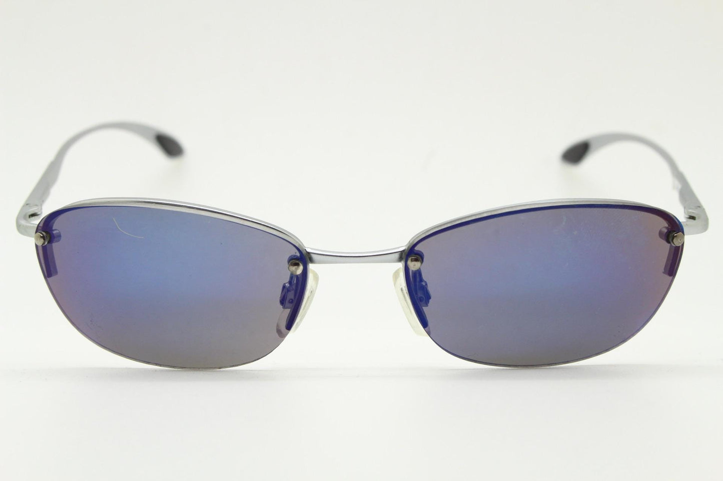 90s vintage small bug eye oval sunglasses. Minimal silver satin finish solid metal half frame with blue mirror lenses. Y2K.  NOS sample