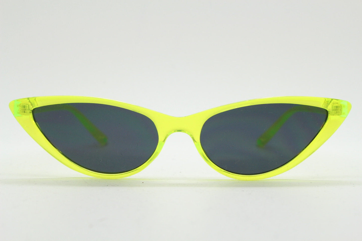 Y2K vintage extreme pointed cat eye sunglasses. Stylised yellow transparent frame with black lenses. Womens 50s style psychabilly. NOS