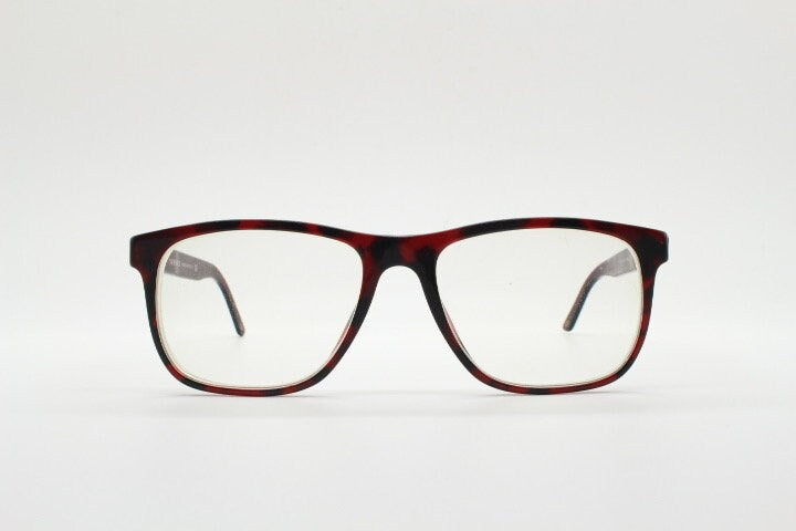 Versace modified wayfarer design eye glasses made in Italy. Mottled brown acetate optical frames with subtle logo. Prescription eyeglasses