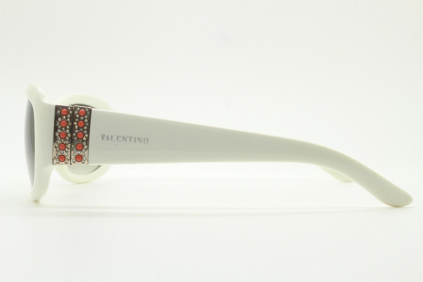 Valentino Y2k vintage wrap around bug eye sunglasses. Curving white acetate shield frame with orange and diamante stones. 2000s. Rhinestone