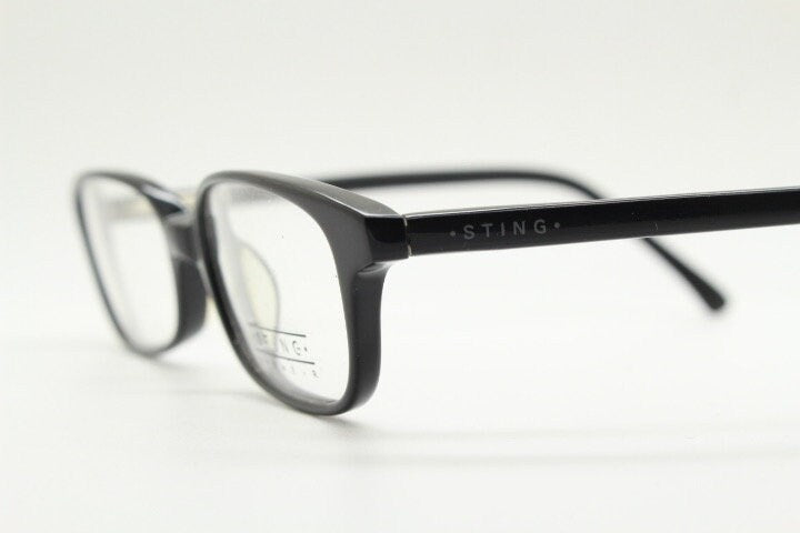 Sting 90s vintage rectangular eye glasses made in Italy. Plain black gloss low profile acetate optical frames. Prescription RX. NOS