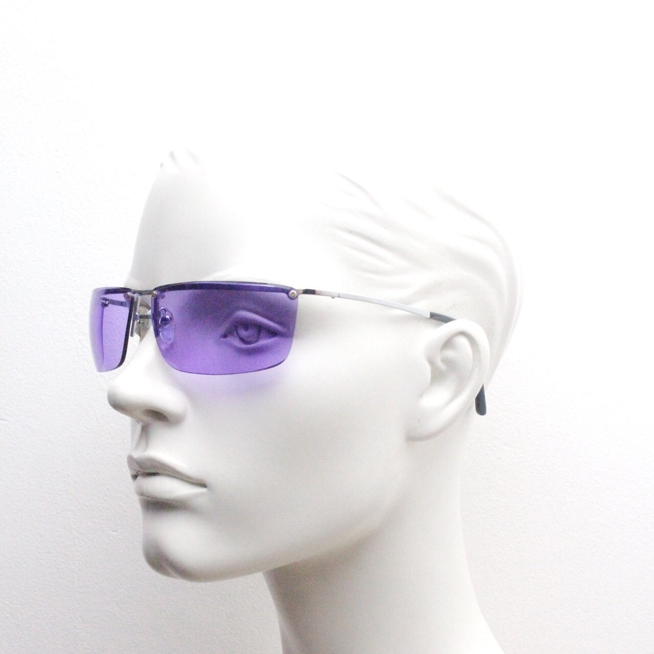 Y2K vintage purple shield sunglasses. 2000's half frame wraparound aerodynamic mini mask visor with curving lenses. 90s 00s unused NOS