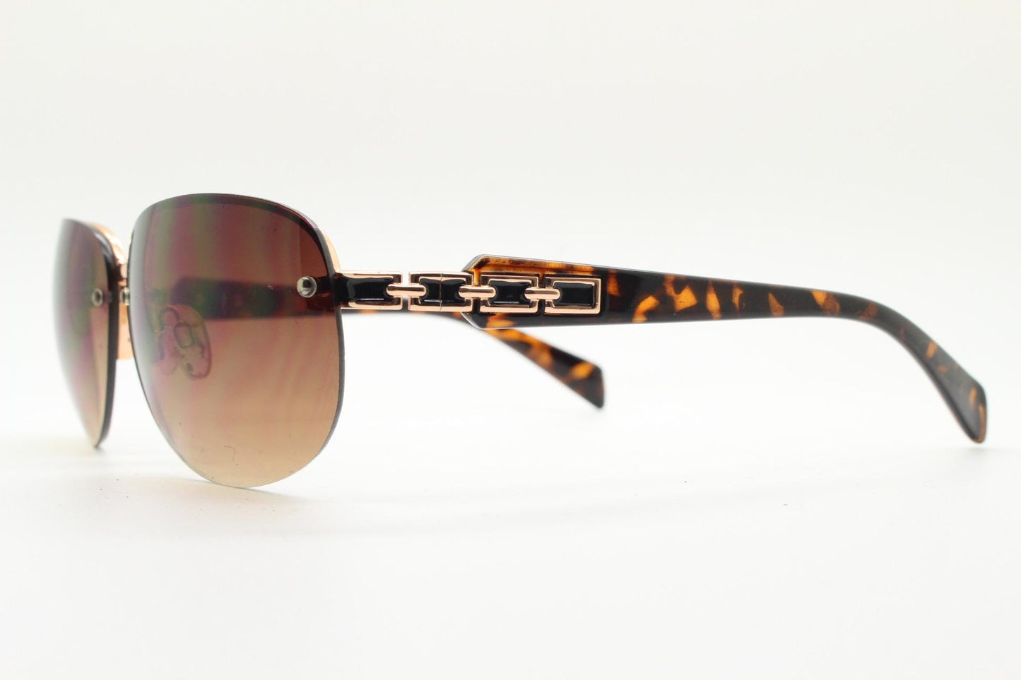 Y2K vintage rectangular brown sunglasses. Gold half frame with tortoise arms, chain link temples and graduating lenses. 2000's NOS