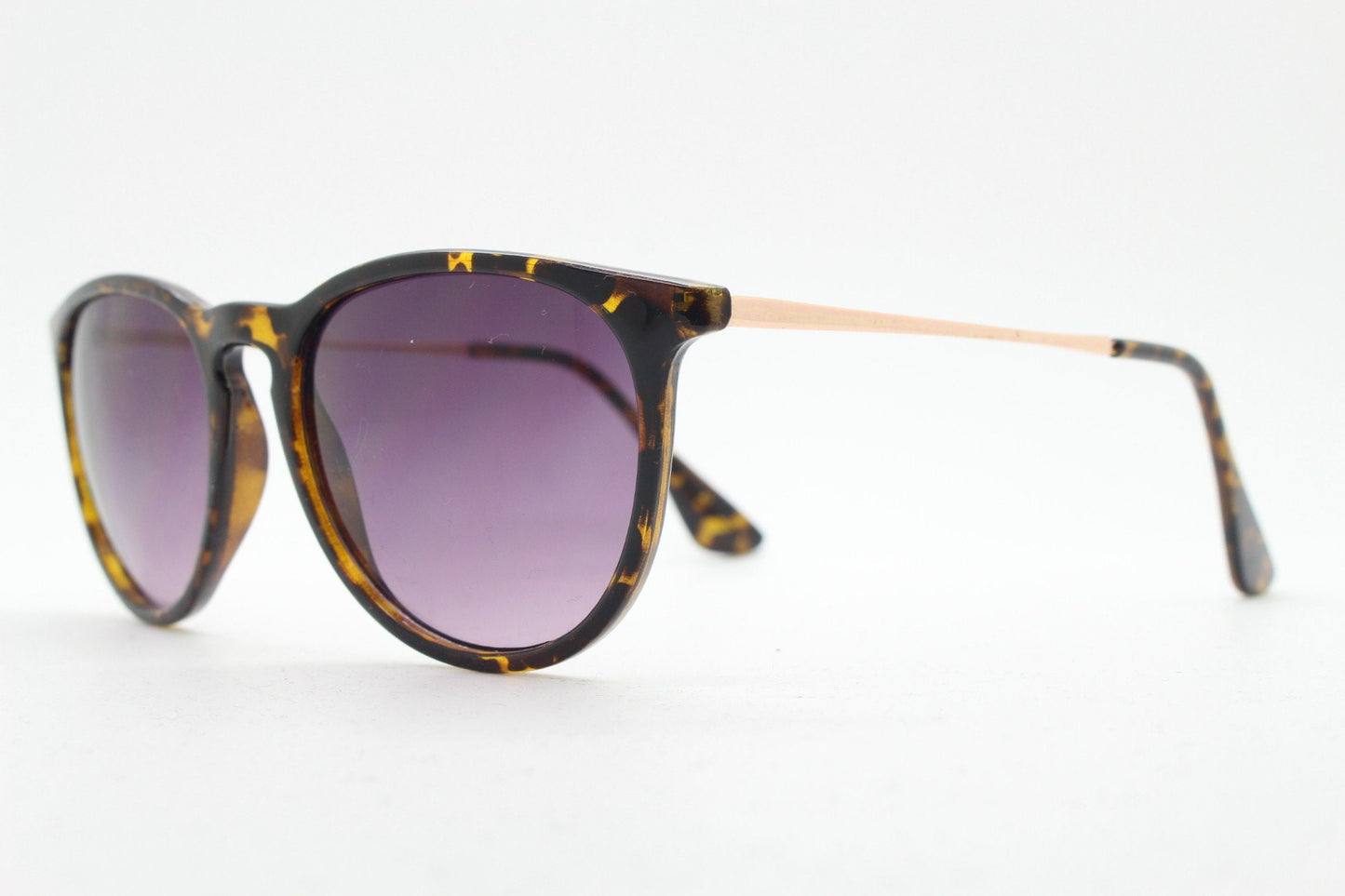 90s vintage sunglasses. Tortoise gloss frame with graduating black lenses and contrasting gold arms. Unused NOS