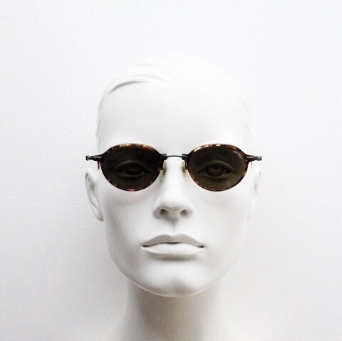 Sting 90s vintage oval sunglasses made in Italy. Refined 'industrial tech' fused with 1930s style in bronze metal and tortoise . Unused NOS