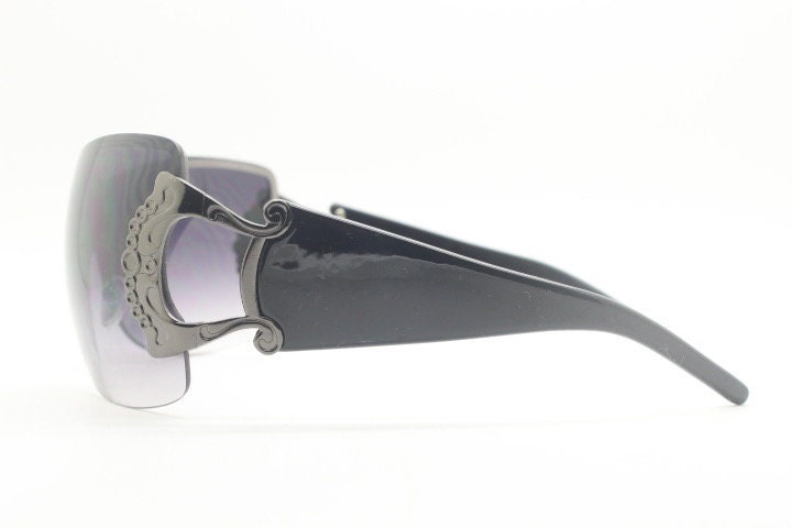 Y2K vintage futuristic visor sunglasses. 2000's black wraparound mono lens mini mask shield design. Superhero. 00's NOS