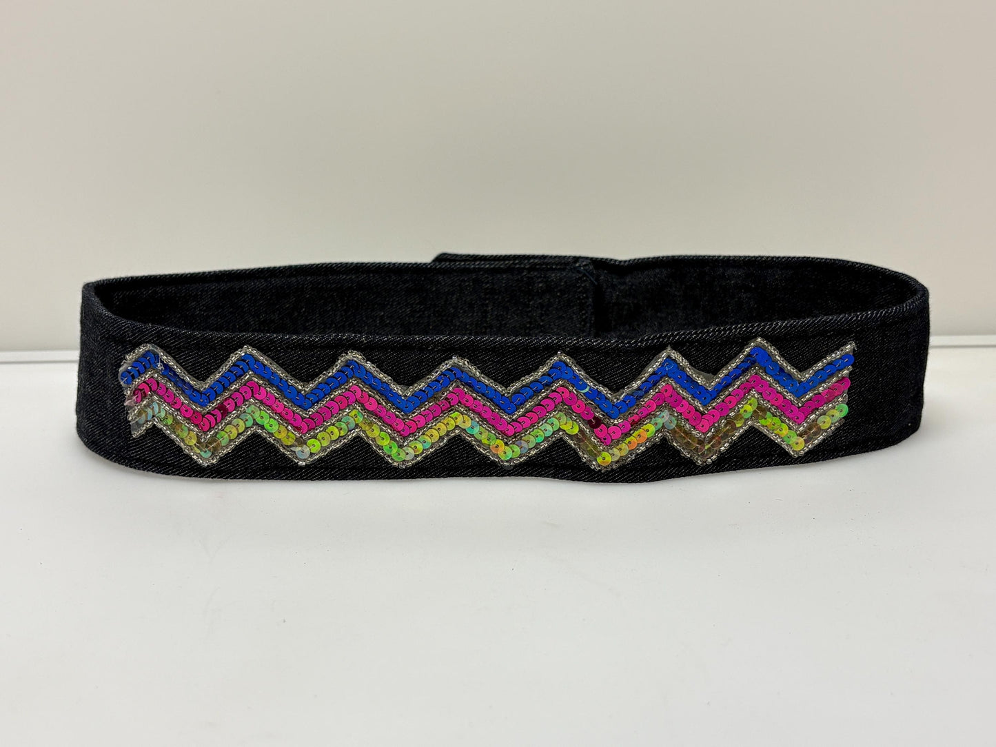 Y2K vintage womens dress belt in dark blue denim with rainbow sequins zig zag applique in neat proportions. Vegan. 2000s Unused NOS