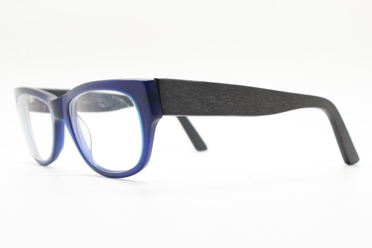 Chunky frame modified cat eye glasses. Superior quality optical eyeglasses. Deep blue front with wood look arms. Prescription RX Spectacles