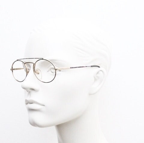 90s vintage oval eye glasses. Gold metal optical frame with vibrant enamel pattern and prominent double bridge. Prescription spectacles. NOS