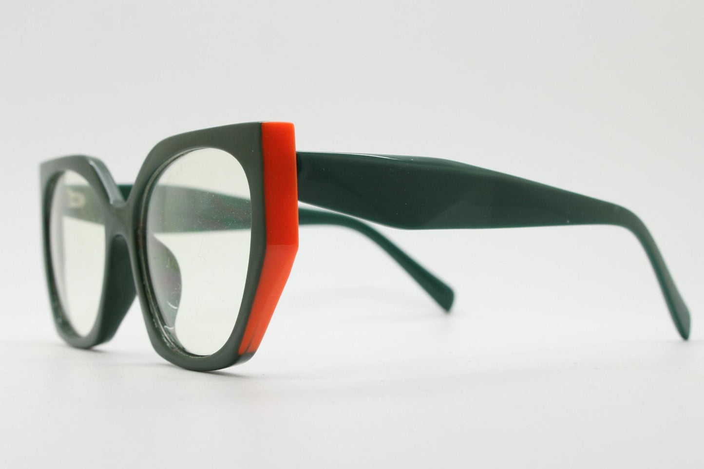 Sharp angled flat top  cat eye glasses. Refined green cateye optical frame with bright orange side sections. Prescription RX Spectacles