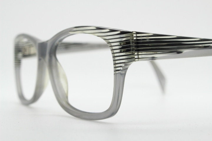 Alain Mikli rectangular eye glasses made in France. Dynamic black and white striped layered acetate grey optical frame. Prescription RX