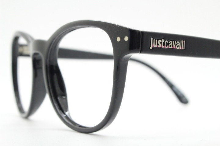 Just Cavalli vintage round eye glasses. Black gloss acetate optical frames with keyhole bridge. Prescription RX spectacles