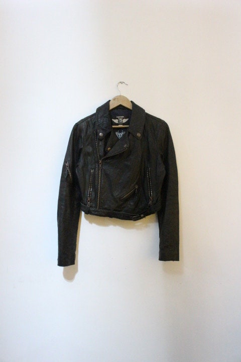 Diesel black fitted womens motorcycle jacket. Genuine leather cropped biker design with fixed adjustable belt. Over 30% sale rrp 469 GBP
