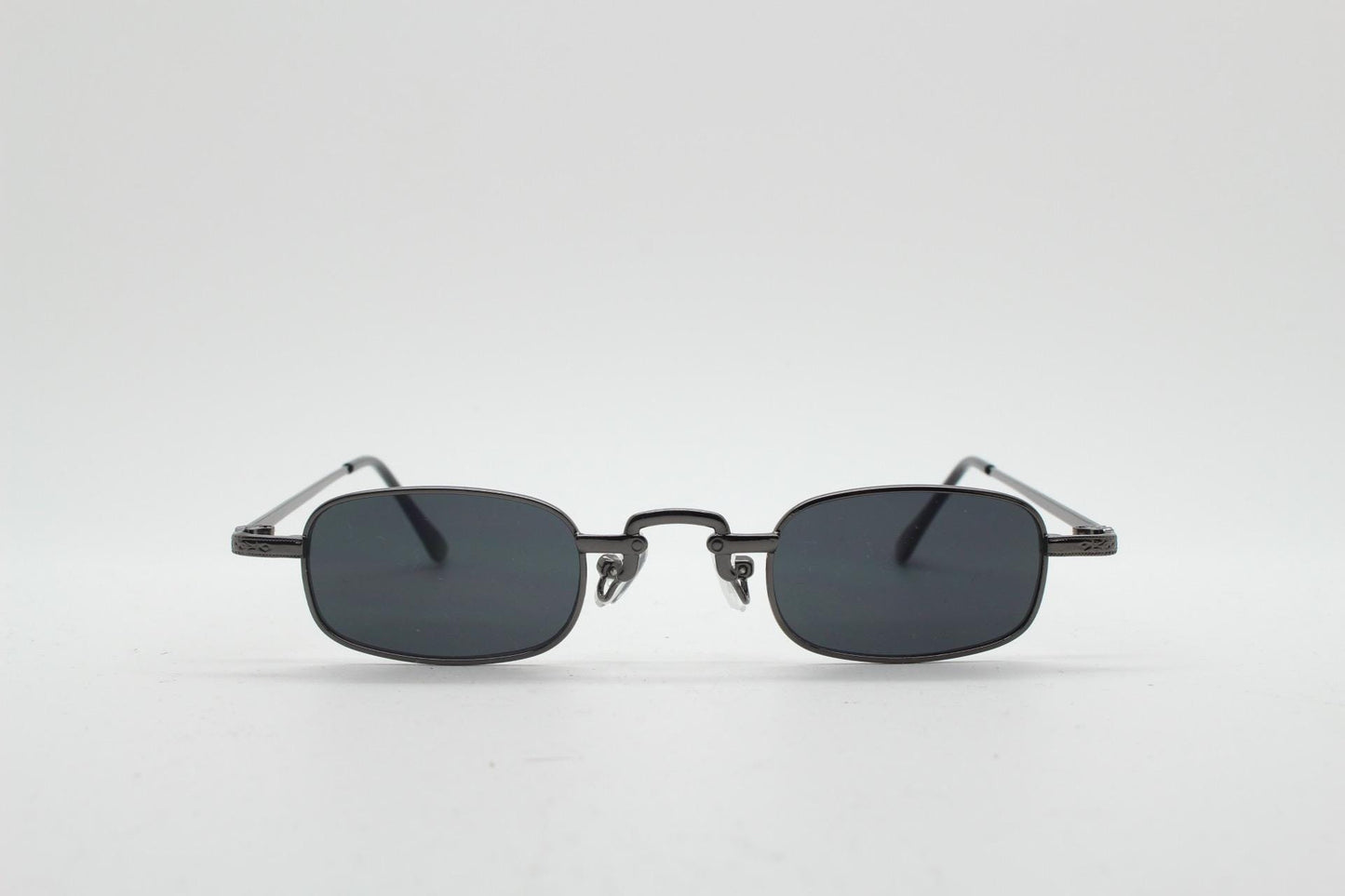 90s vintage small rectangular sunglasses. Imposing minimal gunmetal grey victorian style frame with black lenses. Steampunk. Unused NOS