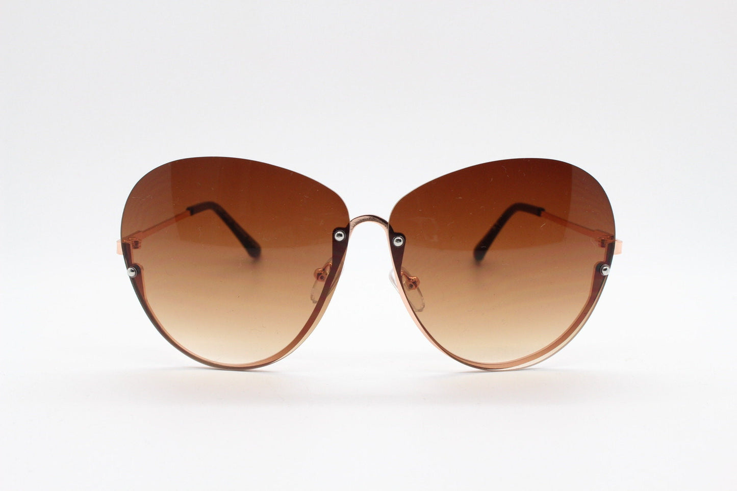 Y2K vintage large rimless sunglasses. Women's 70s style half frame design with graduating brown lenses and gold arms. 2000s BNWT