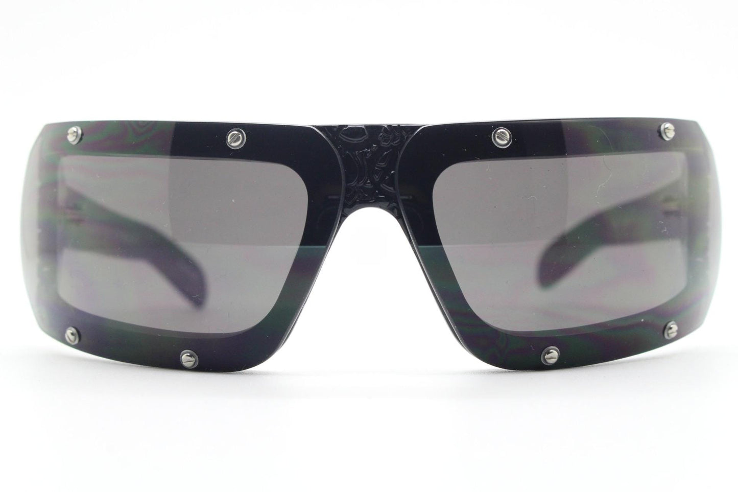Buddhist Punk wrap around sunglasses hand made by Linda Farrow. Black acetate frame with abstract cut out patterns. Projects. Vintage. NOS