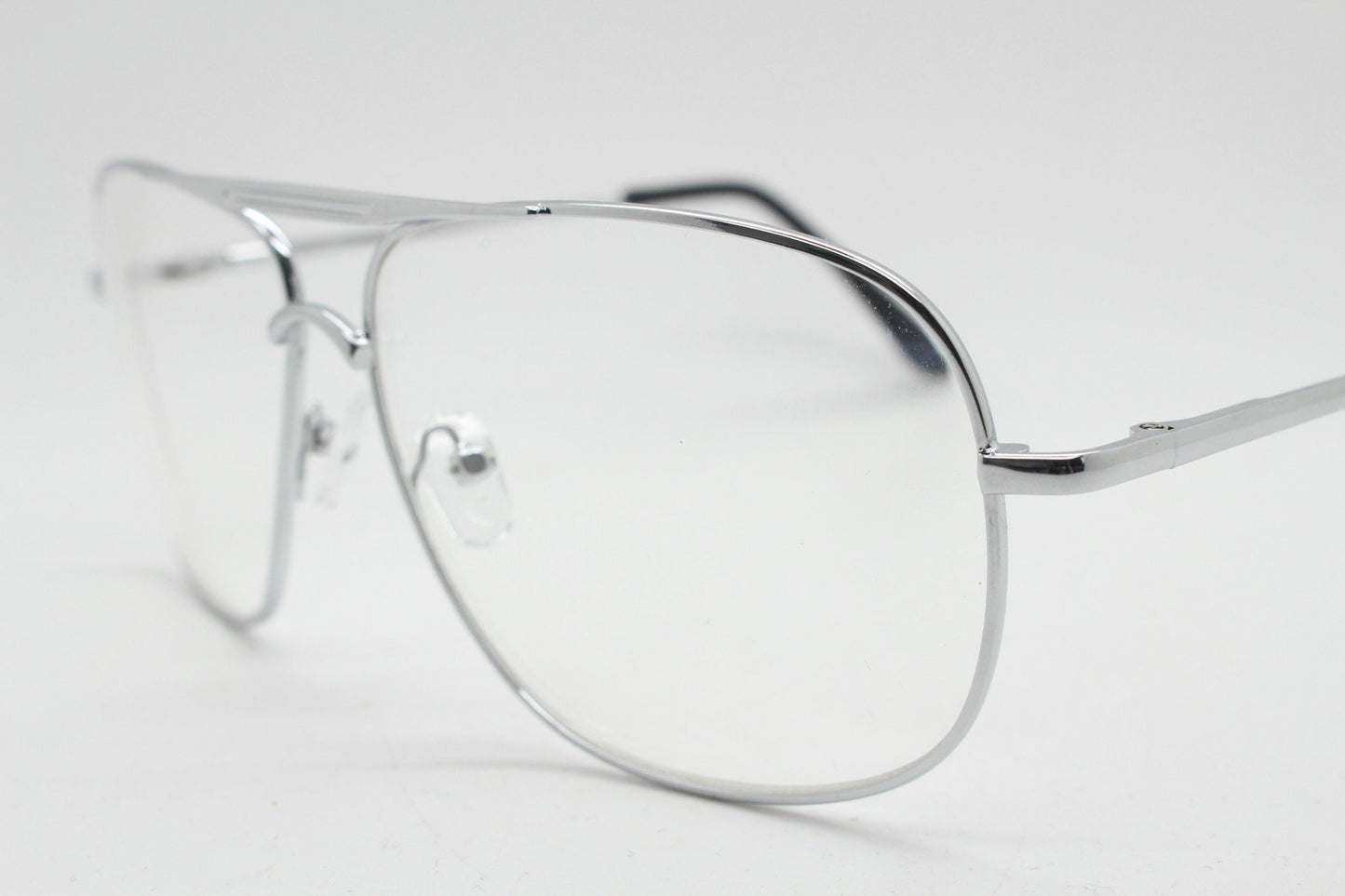 Y2K vintage square aviator glasses. Mens 70s style silver chrome frame with clear lenses. Unused NOS aviators