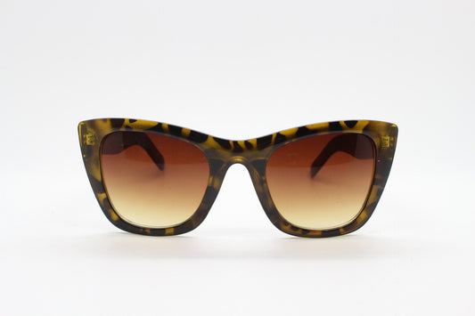 Vintage Y2K pointed cat eye sunglasses. Womens sharp angled cat eye with radiant tortoise frame. 50s rockabilly, pin up. 2000s NOS cateyes