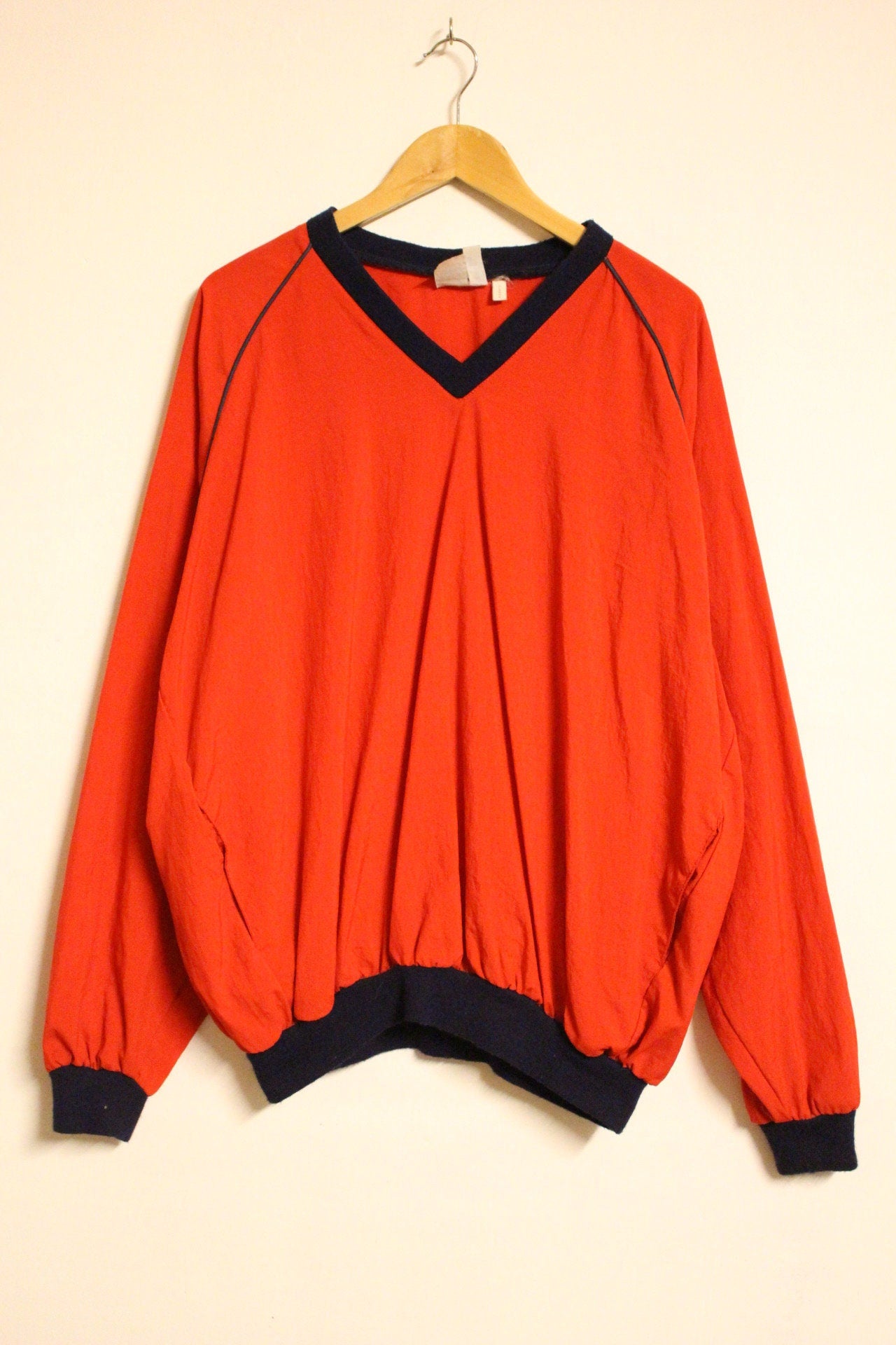 Vintage 80s oversized v neck pullover. Made in England. Bright red baggy football style unisex top. Club kids jumper. Rave