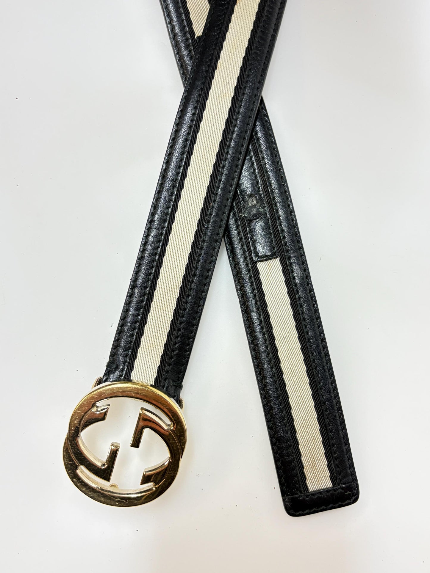 Gucci 90s vintage 1" jeans belt made in Italy. Black genuine leather with neat sized logo buckle and central cream textile section