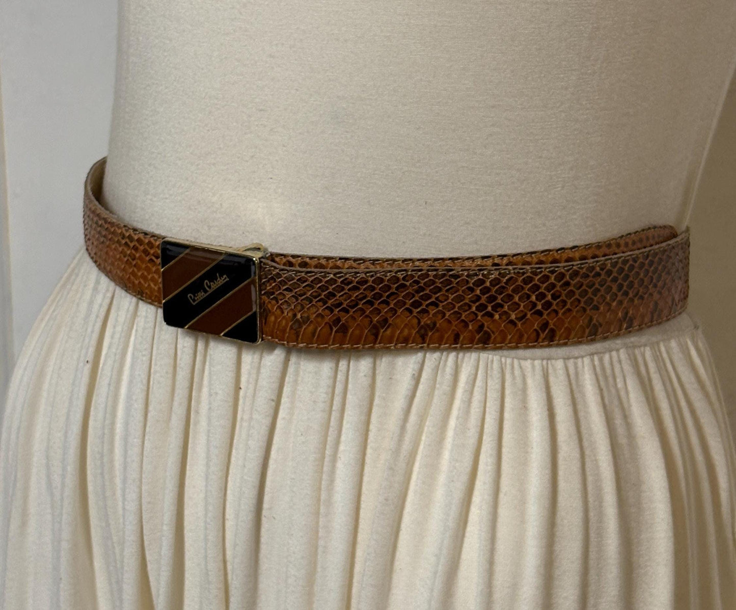 Pierre Cardin 80s vintage belt in genuine snakeskin with neat sized rectangular enamelled black and brown striped buckle. Made in Italy