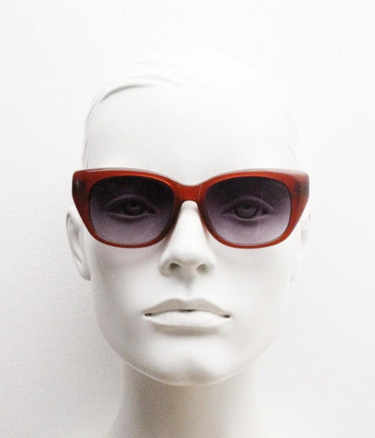 Vintage 90s rectangular cat eye sunglasses. Womens transparent brown acetate cateye in sensible proportions with graduating lenses. NOS