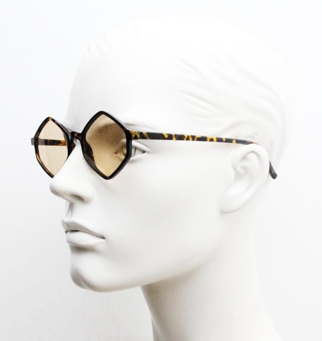 90s vintage diamond hexagon sunglasses. Atmospheric 6 sided tortoise gloss frame with very light tone brown lenses. Unused NOS