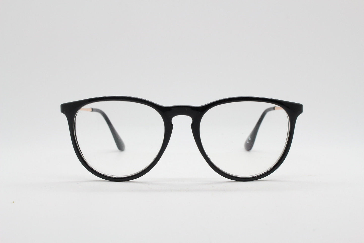 90s vintage black slim glasses. Slightly oversized optical frames in black gloss. Prescription eyeglasses with clear lens. RX spectacles